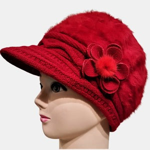 Winter peaked cap in red with floral detail 