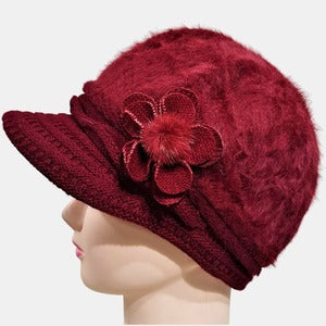 Winter peaked cap in burgundy with floral detail 
