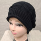 Front view of Knitted beanie cap in black 