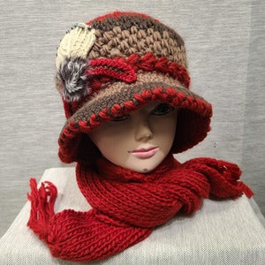 Front view of Winter cap and scarf set in shades of red and brown