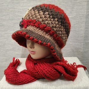 Side view of Winter cap and scarf set in shades of red and brown