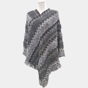 Poncho in black and various shades of grey