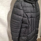 Side view of Hooded winter jacket in black color 