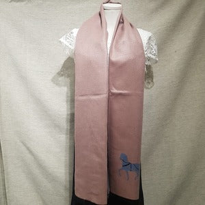 Warm scarf in light pink with blue accent color