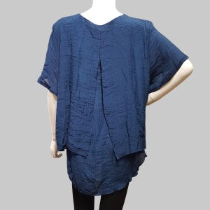 Back view of blue, layered summer top