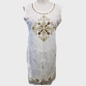 Full view of white fancy tunic top with sequin