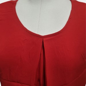 Neckline detail of plain red sleeveless layered top