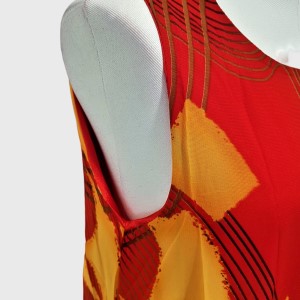Closer view of red and yellow colorful print long summer dress