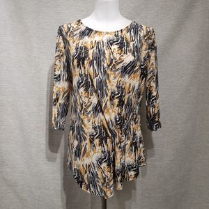 Full view of graphic print top with slight gathering in front