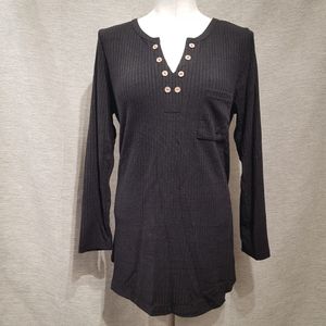 Full view of black top with notch neckline