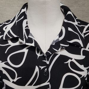 Shirt collar neckline of black white printed shirt
