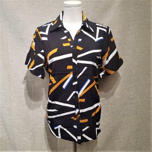 Dress shirt in black with yellow and white print