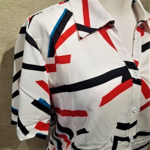 Side view of dress shirt in white with black and red print