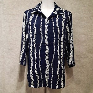Full view of blue and cream printed collar dress shirt