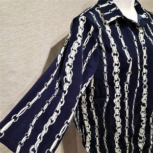 Side view of blue and cream printed collar dress shirt