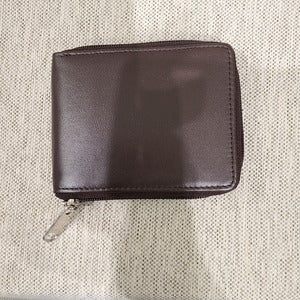 Closed view of wallet for men in brown with zip closure