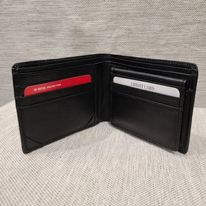 Open view of Flap wallet in black for men