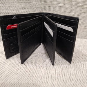 Flap wallet in black for men when opened