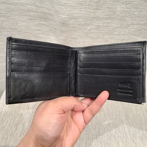 Another view of the card holder slots in black flap wallet