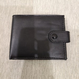 Closed view of Flap leather wallet for men with button closure 