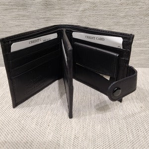 Flap leather wallet for men with button closure when opened