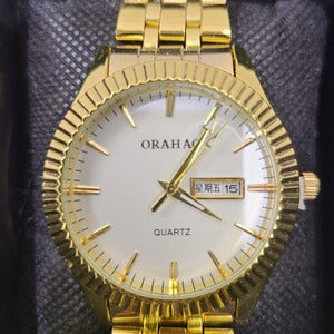 Closer view of Round face gold frame wristwatch for men
