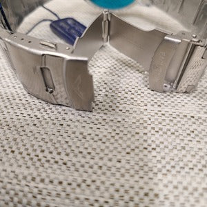Clasp closure on silver men's watch when unfolded