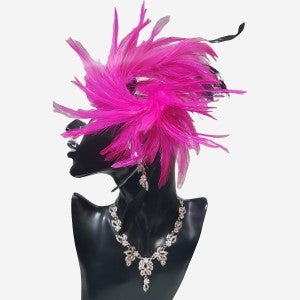 Fascinator adorned with bright pink and black feathers
