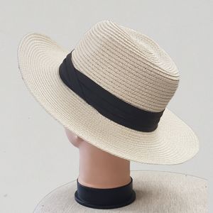 Panama hat in white with black ribbon 