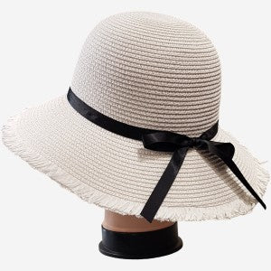 White summer hat with black ribbon and bow tie