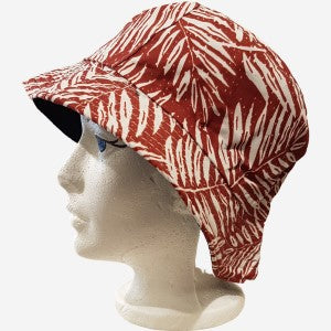 Bucket hat in rust color with white leafy print