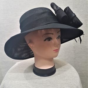 Side view of Formal dress hat in black with bow and feather