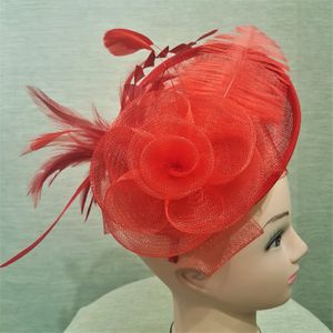 Top view of red cambric with feathers fascinator
