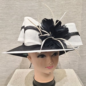 Front view of Formal dress hat in black and white color combination