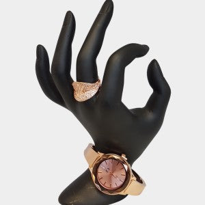 Rose gold bangle watch with colored dial