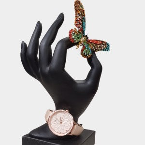 Wrist watch with light pink leather strap and round dial