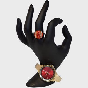Bangle watch in gold with red colored round dial