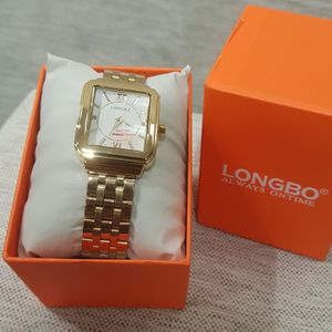 Rectangular face wrist watch with gold chain strap