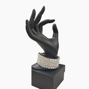 Wrap around silver color bracelet adorned with stones