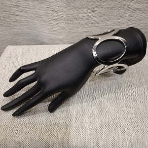 Full view of elegant silver color wide cuff bracelet