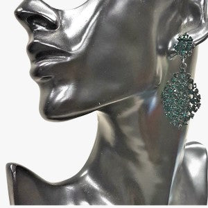 Chandelier earrings with emerald-green stones