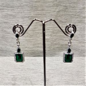 Delicate dangle earrings with square green stone