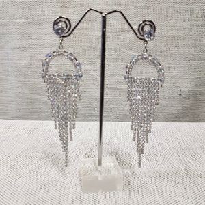 Silver color chandelier earrings with stones