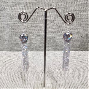 Silver color dangle earrings with stones