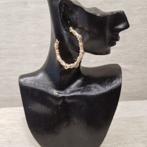 Bold gold frame open hoop earrings