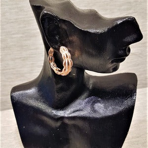 Beautiful medium sized rose gold hoop earrings with stones