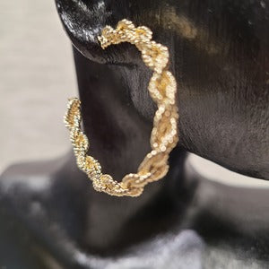 Closer view of Twined hoop earrings in gold frame