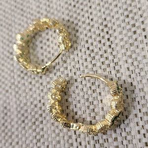 Latch back post on hoop earrings with green and white stones
