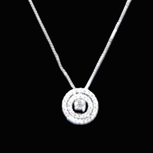 Silver color necklace with concentric ring pendant