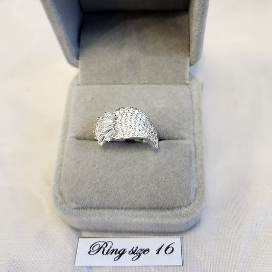 Stunning silver frame ring adorned with clear stones